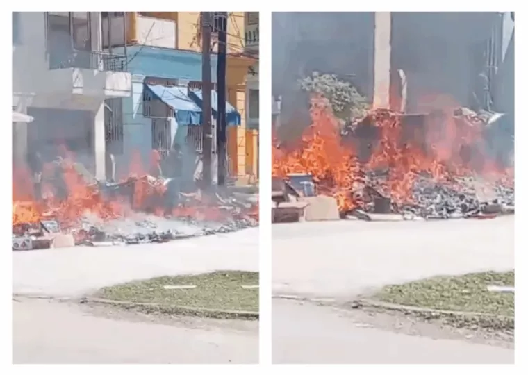 Contenedores incendiados en el barrio de Santos Suárez.