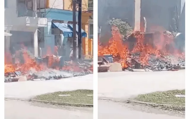 Contenedores incendiados en el barrio de Santos Suárez.