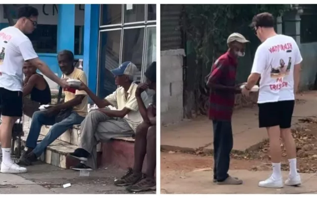 Sandro Castro entregando cajas de comida a personas vulnerables en La Habana.